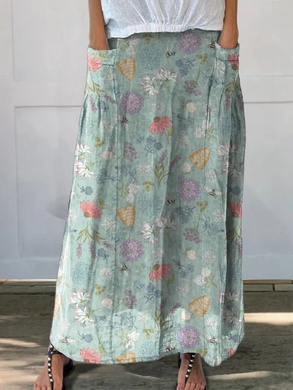DAISY | GONNA CON TASCHE CON STAMPA FLOREALE PRIMAVERILE E API