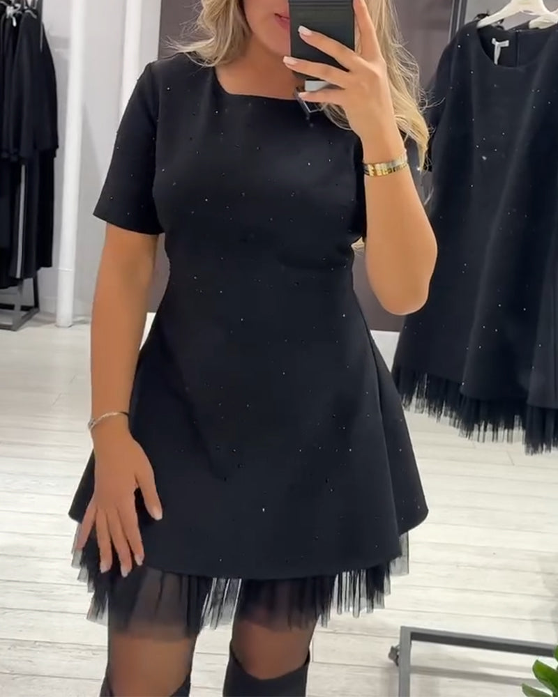 CHRISTEL | MINI ABITO CON ORLO IN TULLE SCINTILLANTE