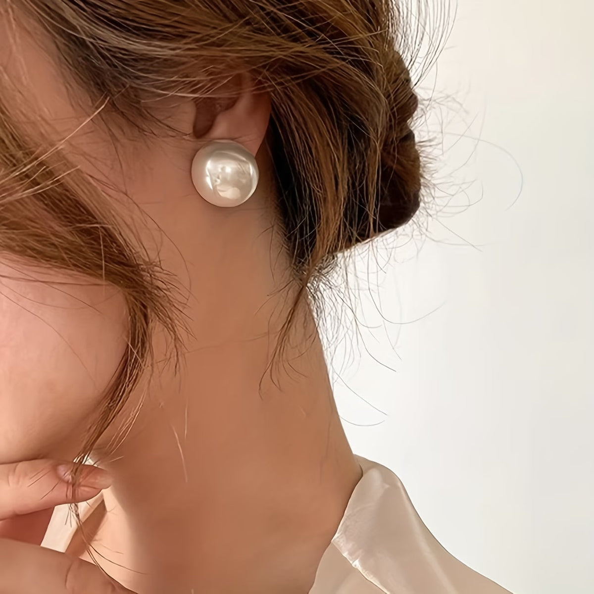 VIVIENNE | GLI ORECCHINI A LOBO CON PERLA STATEMENT