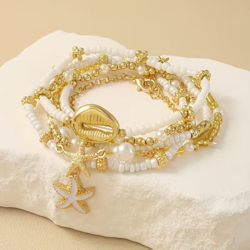 CORALIA | SET DI 6 BRACCIALETTI ORO COSTIERO E PERLE