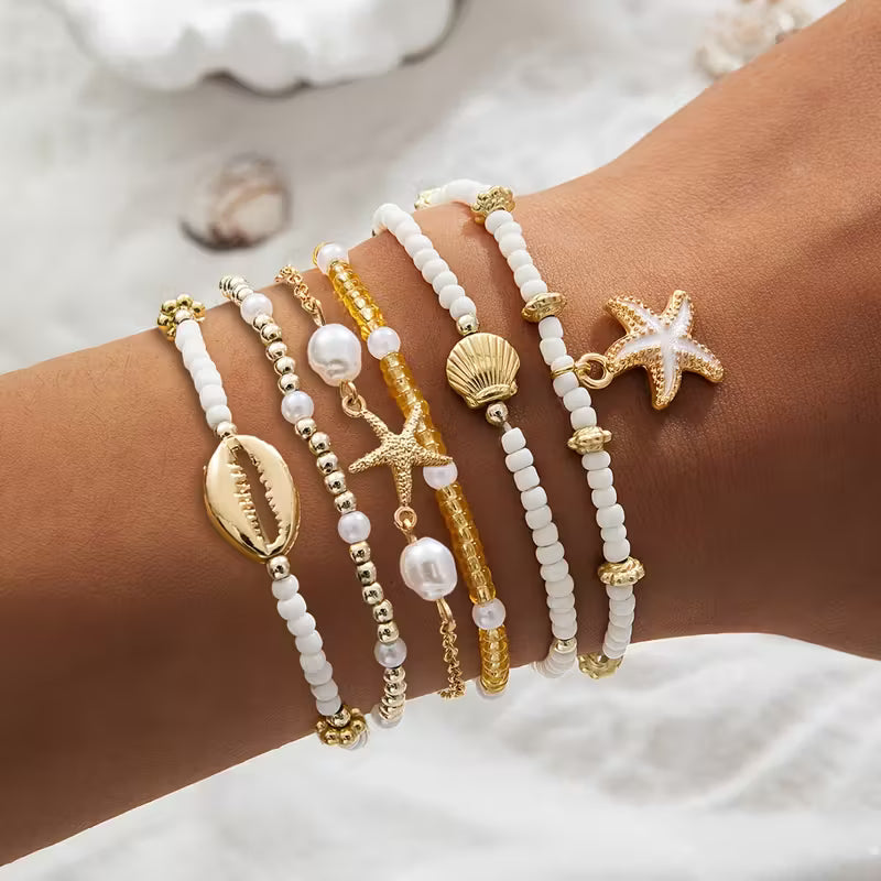 CORALIA | SET DI 6 BRACCIALETTI ORO COSTIERO E PERLE