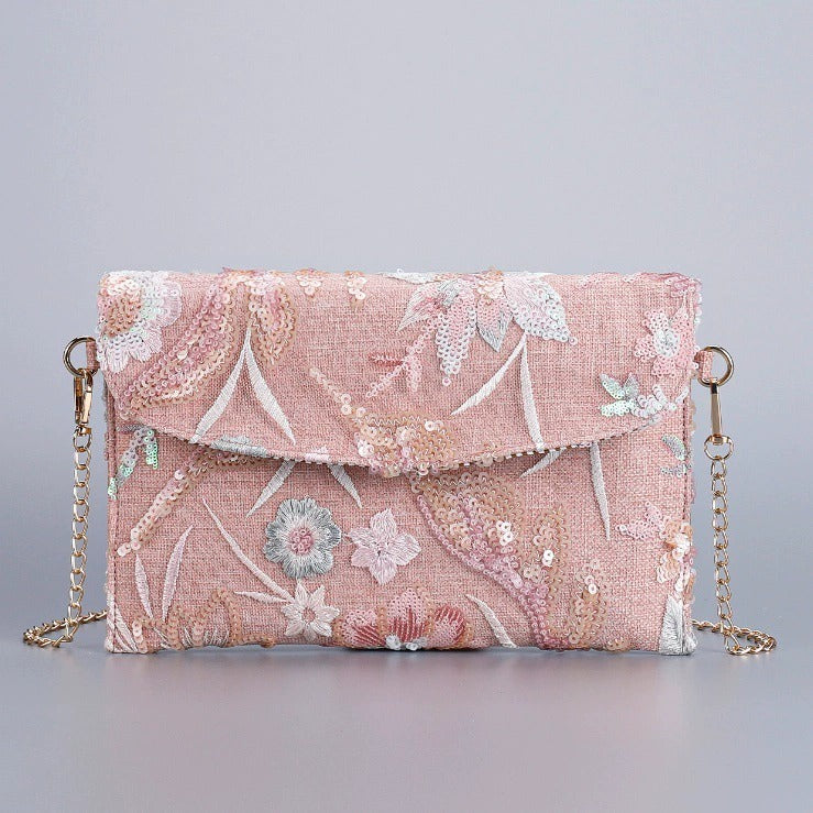 BLUSHGARDEN | BORSA A TRACOLLA CLUTCH CON PAILLETTES A MOTIVO FLOREALE ROSA