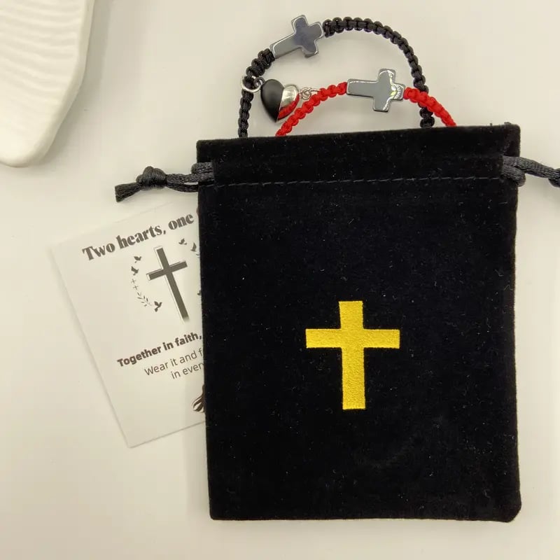 BRACCIALETTO CON CHARM CROCE E CUORE