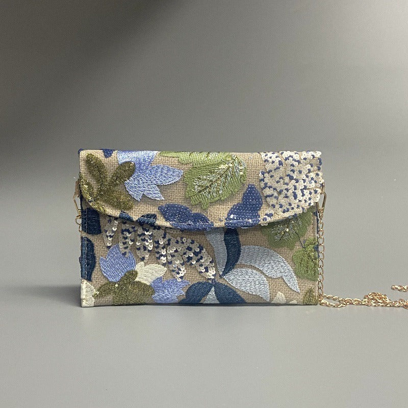SAGEBLOOM | POCHETTE A TRACOLLA CON PAILLETTES BOTANICHE