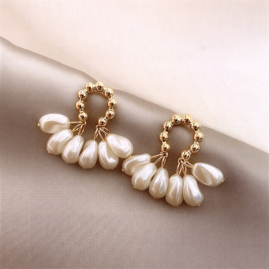 FLEUR | ORECCHINI A CERCHIO CON FIORE DI PERLA