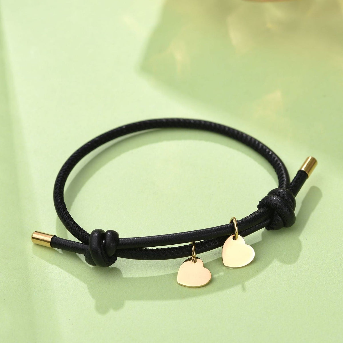 BRACCIALE IN PELLE CON DOPPIO CUORE