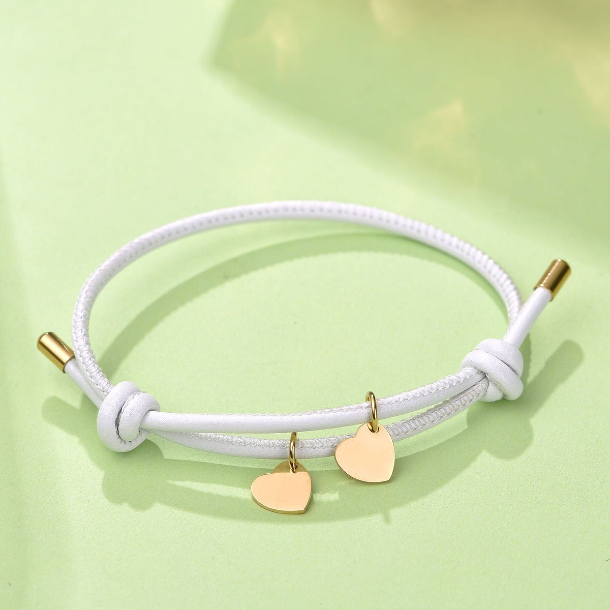 BRACCIALE IN PELLE CON DOPPIO CUORE