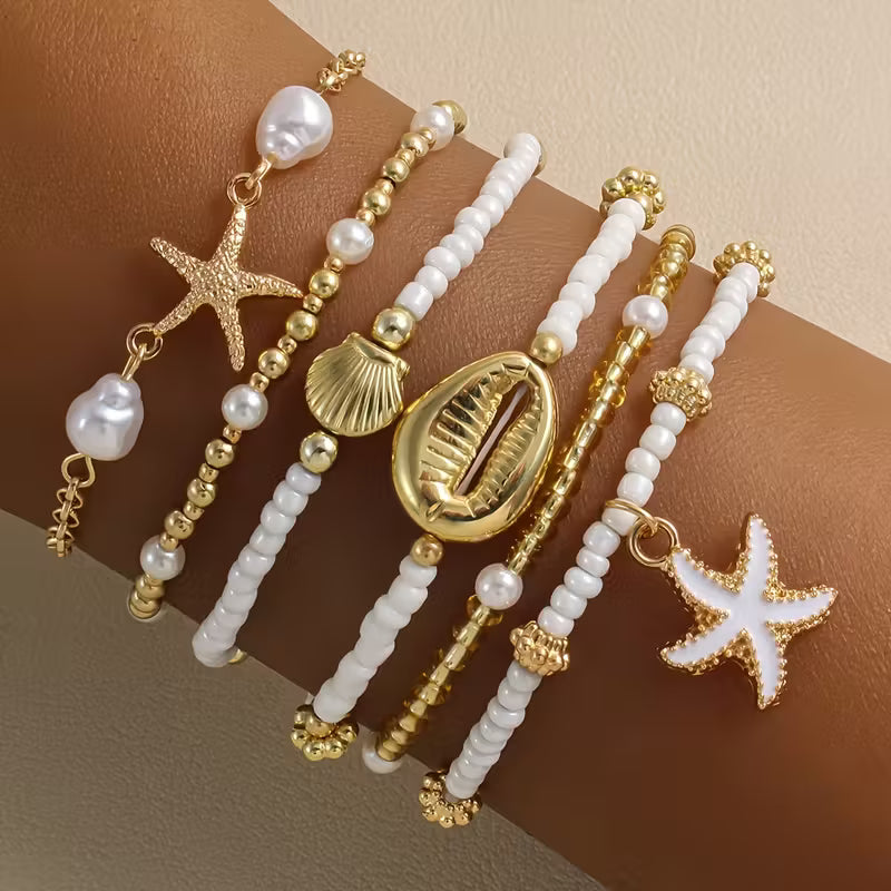 CORALIA | SET DI 6 BRACCIALETTI ORO COSTIERO E PERLE