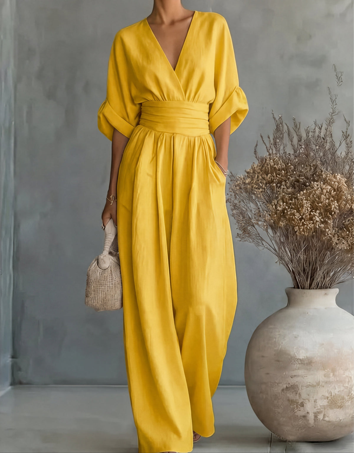 MONICA | ELEGANTE TUTA A GAMBA LARGA CON SCOLLO A V