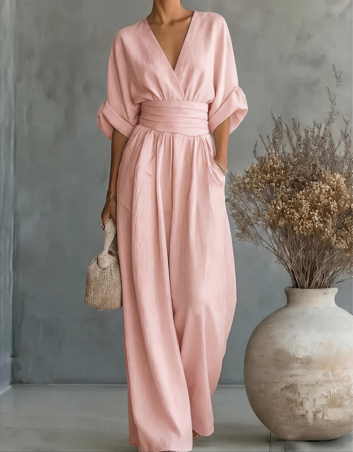 MONICA | ELEGANTE TUTA A GAMBA LARGA CON SCOLLO A V