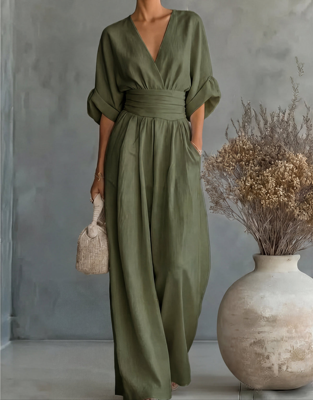 MONICA | ELEGANTE TUTA A GAMBA LARGA CON SCOLLO A V