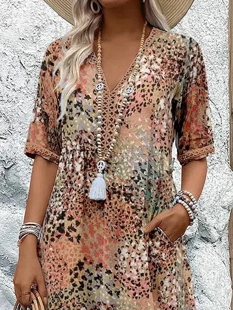GLORIA | VESTITO MIDI VIBRANTE CON ELEGANTE COPERTURA PER IL VENTRE