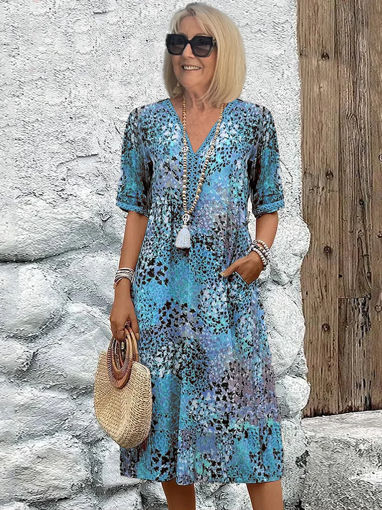 GLORIA | VESTITO MIDI VIBRANTE CON ELEGANTE COPERTURA PER IL VENTRE