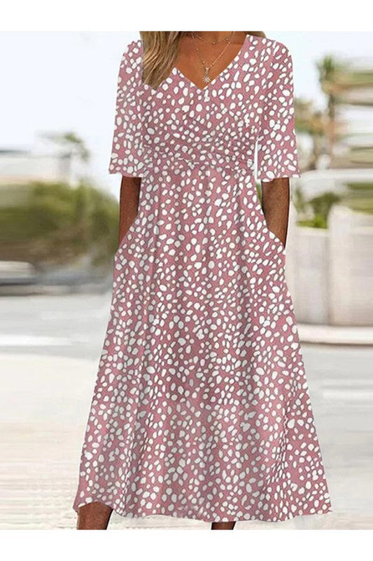 EVELYN | ELEGANTE ABITO MIDI A POIS CHE SLANCI LA FIGURA