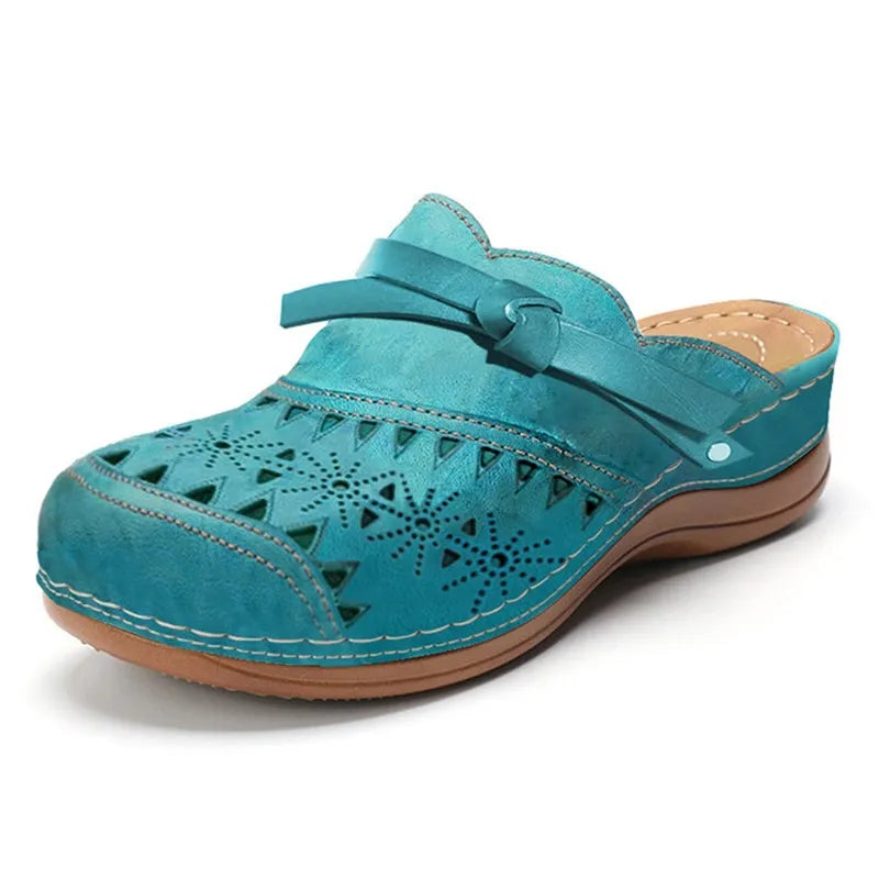KATHLEEN | ZOCCOLI MULE CON CINTURINO FORATO ORTOPEDICO