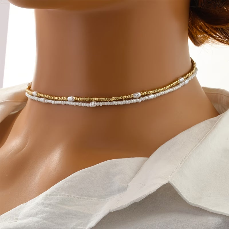 ELARA | SET COLLANA A STRATI CON PERLE E PUNTI LUCE