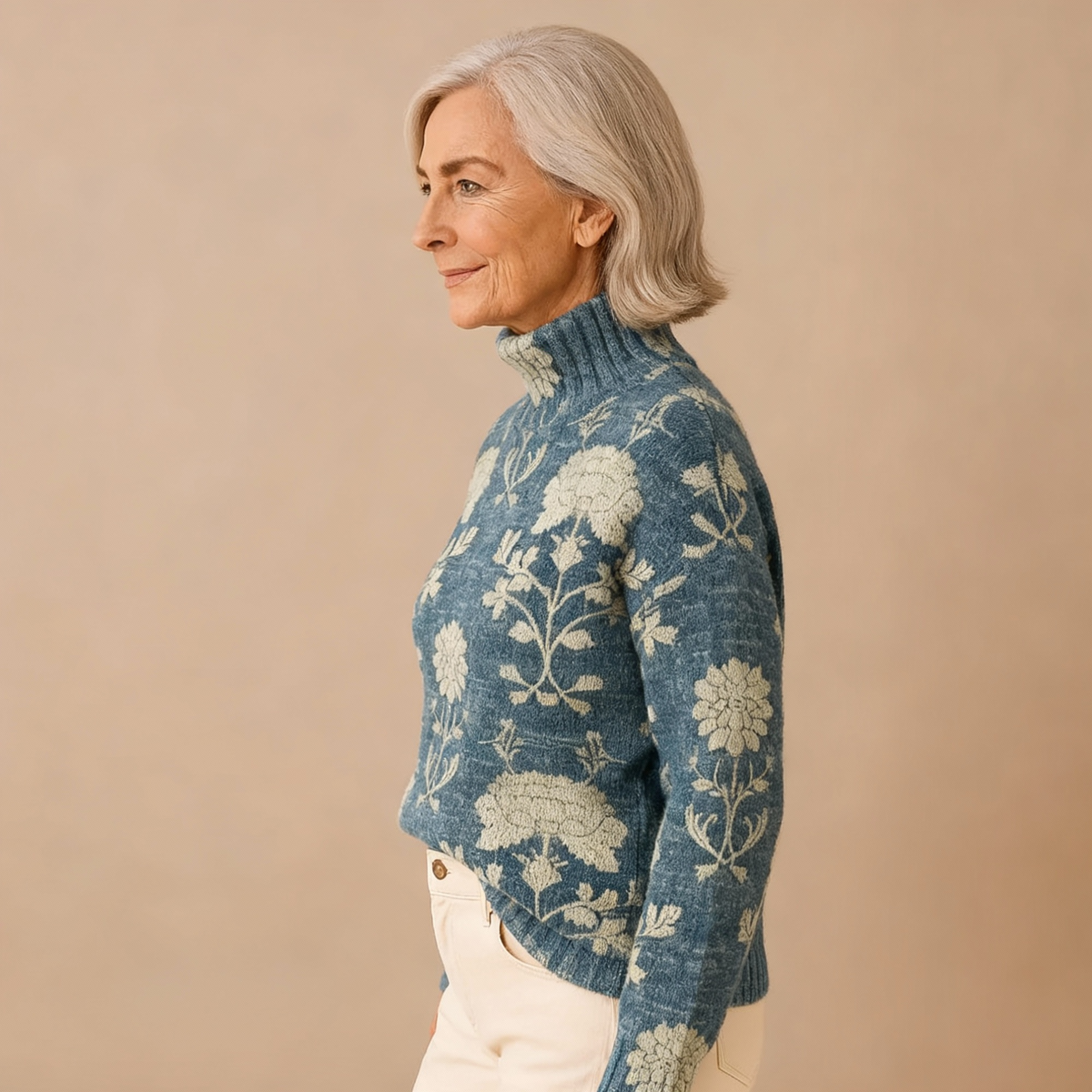 GEORGIA | MAGLIA A COLLO ALTO IN MAGLIA CON MOTIVO FLOREALE SENZA TEMPO