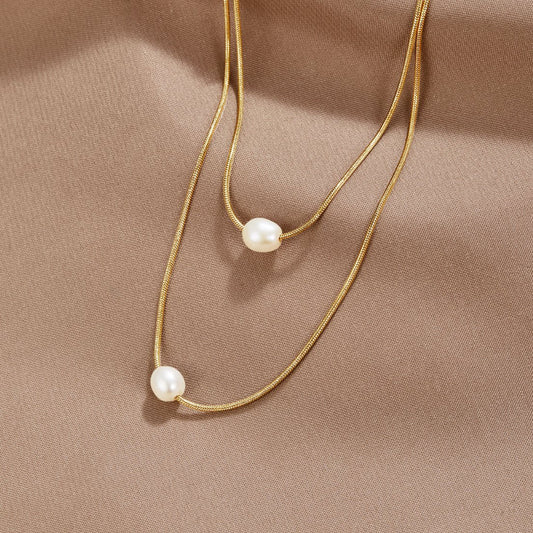 SERAPHINA | COLLANA DI PERLE A STRATI SOFISTICATA