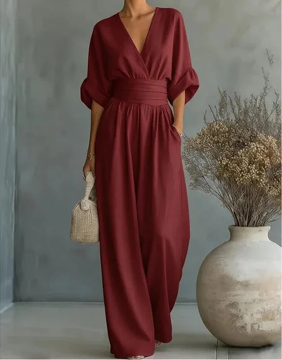 MONICA | ELEGANTE TUTA A GAMBA LARGA CON SCOLLO A V
